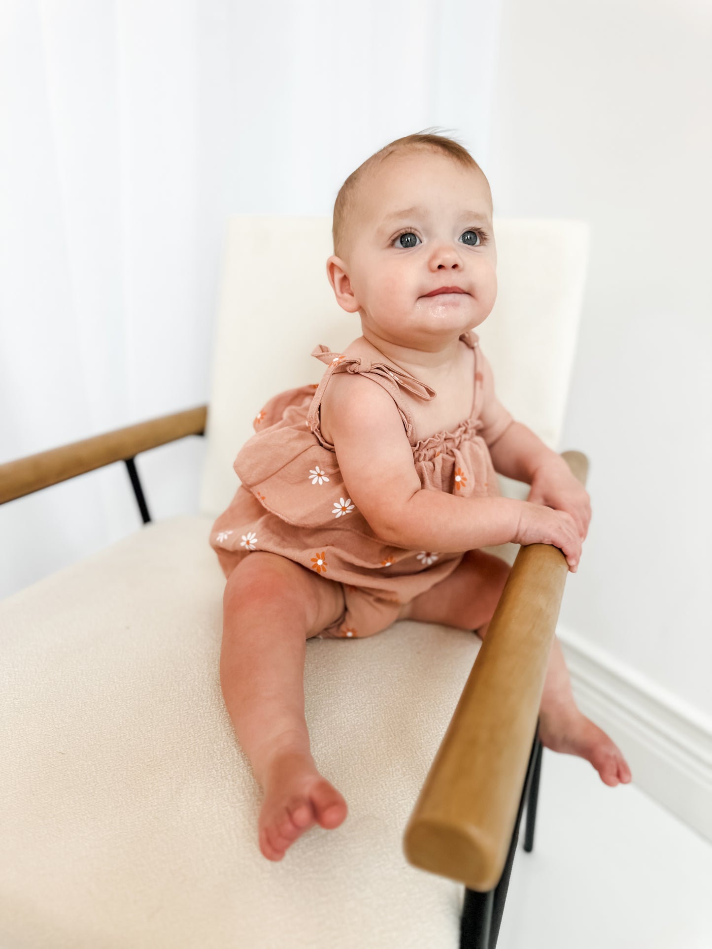 Dusted orange daisy romper