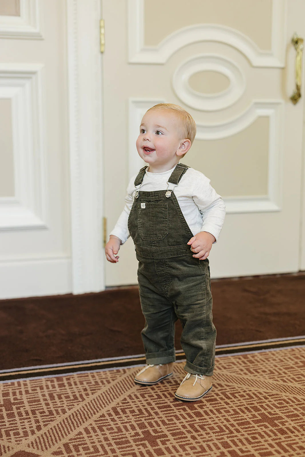 Green corduroy overalls
