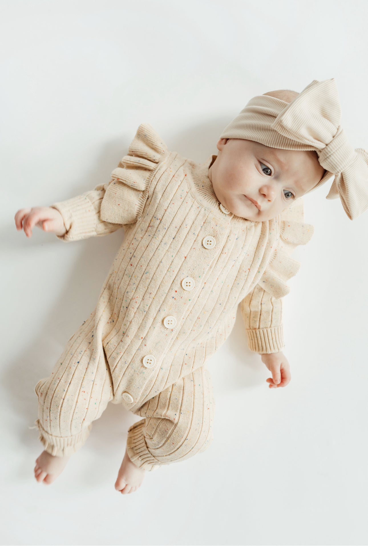 Speckles & flutters sweater romper