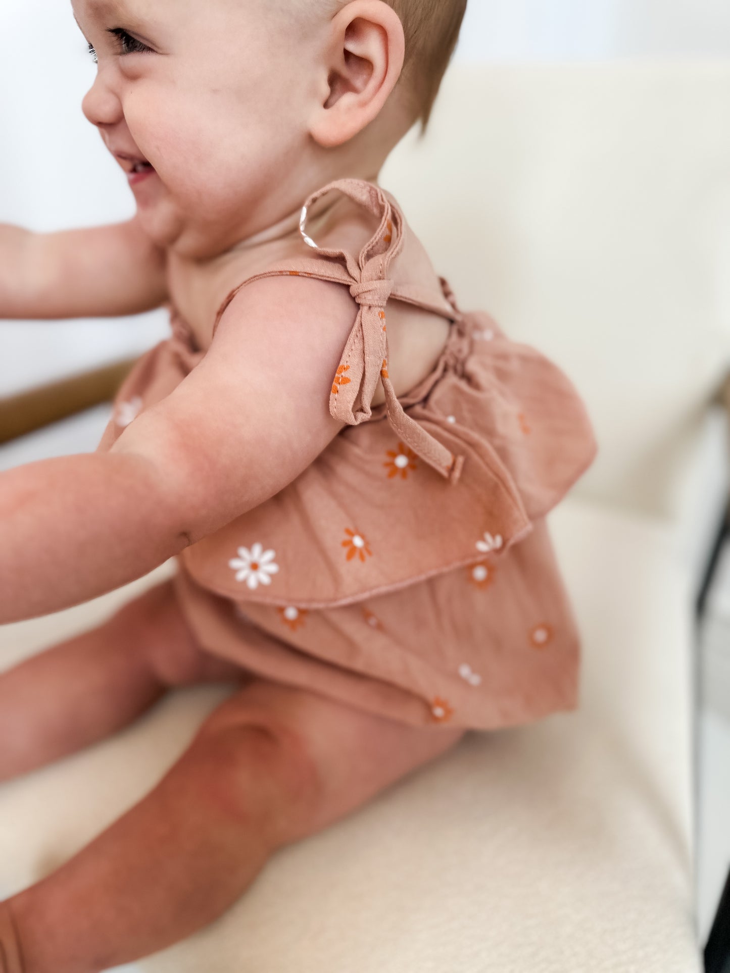 Dusted orange daisy romper