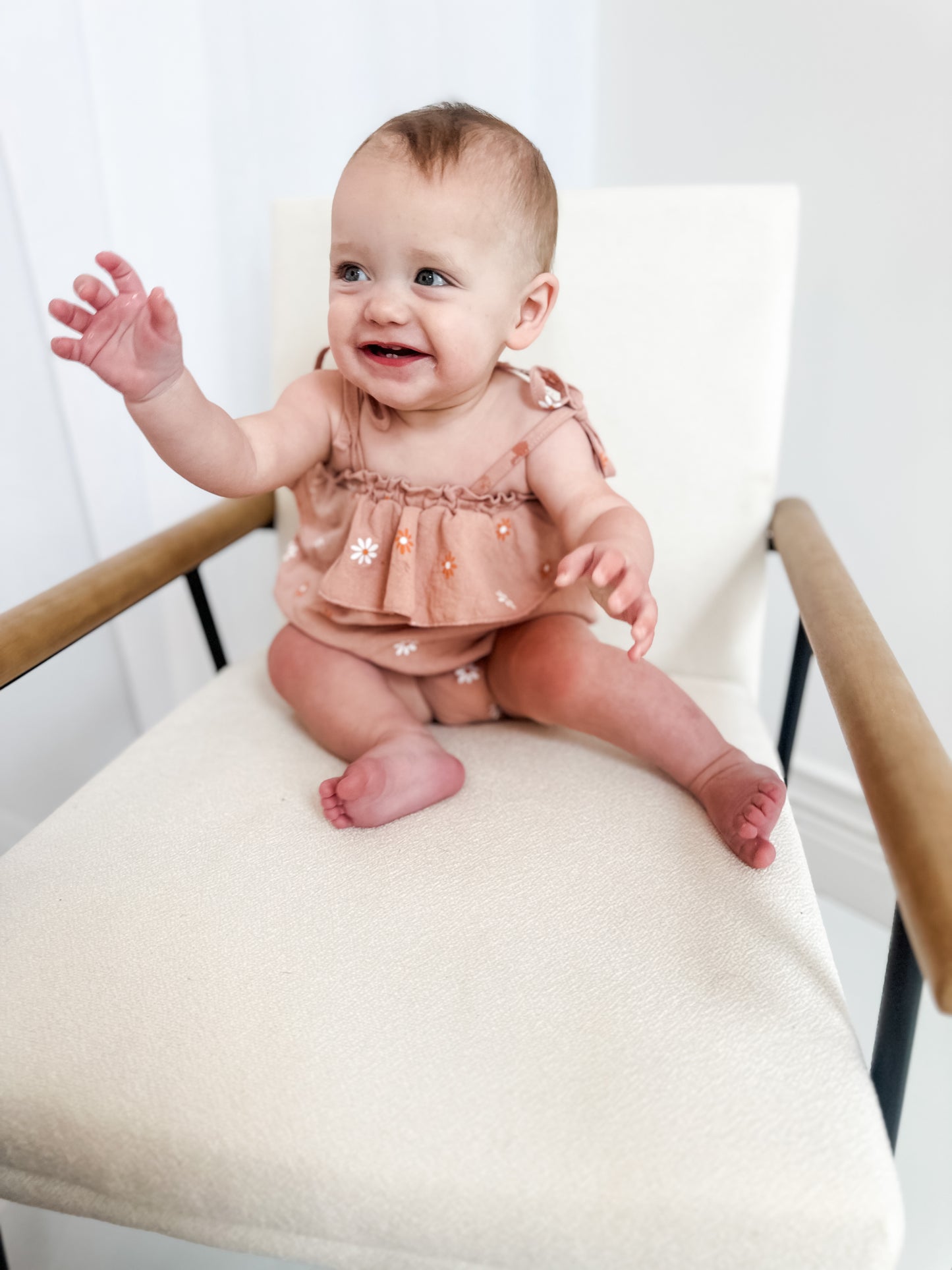 Dusted orange daisy romper