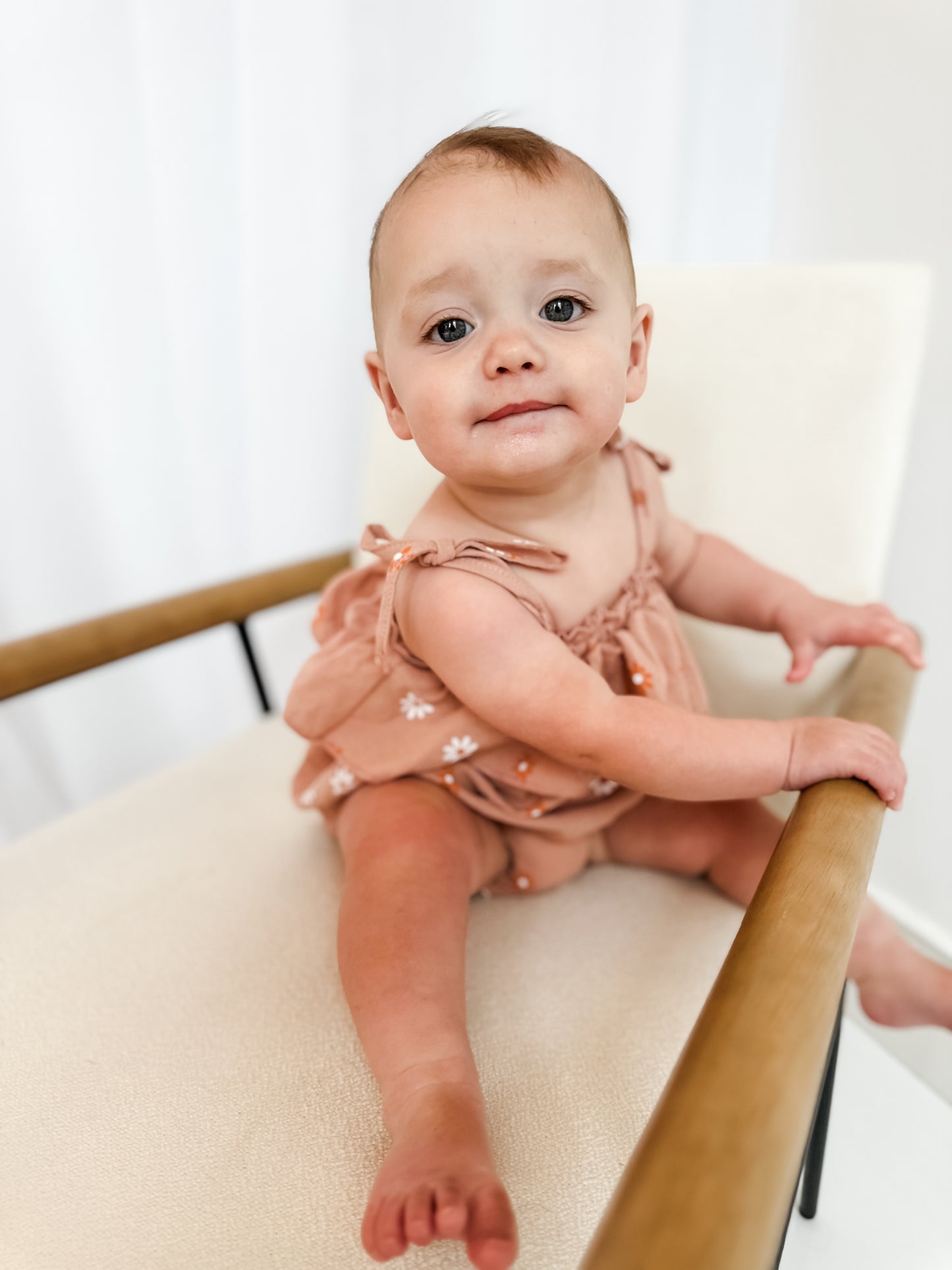 Dusted orange daisy romper