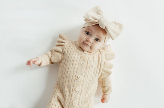 Speckles & flutters sweater romper