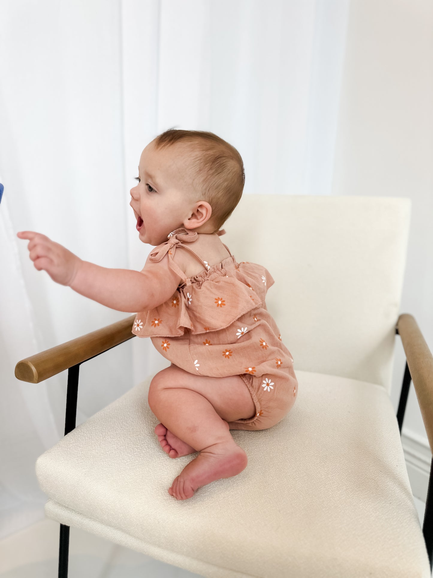 Dusted orange daisy romper