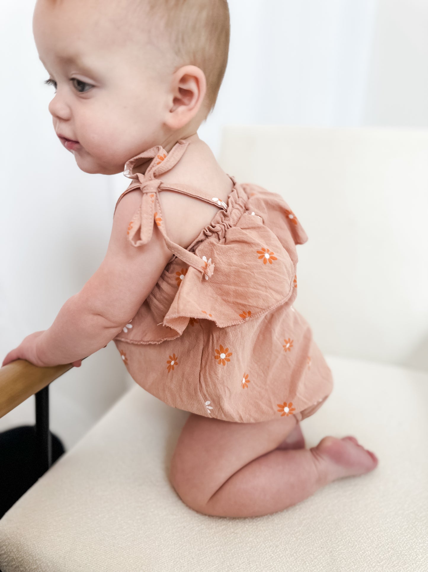 Dusted orange daisy romper