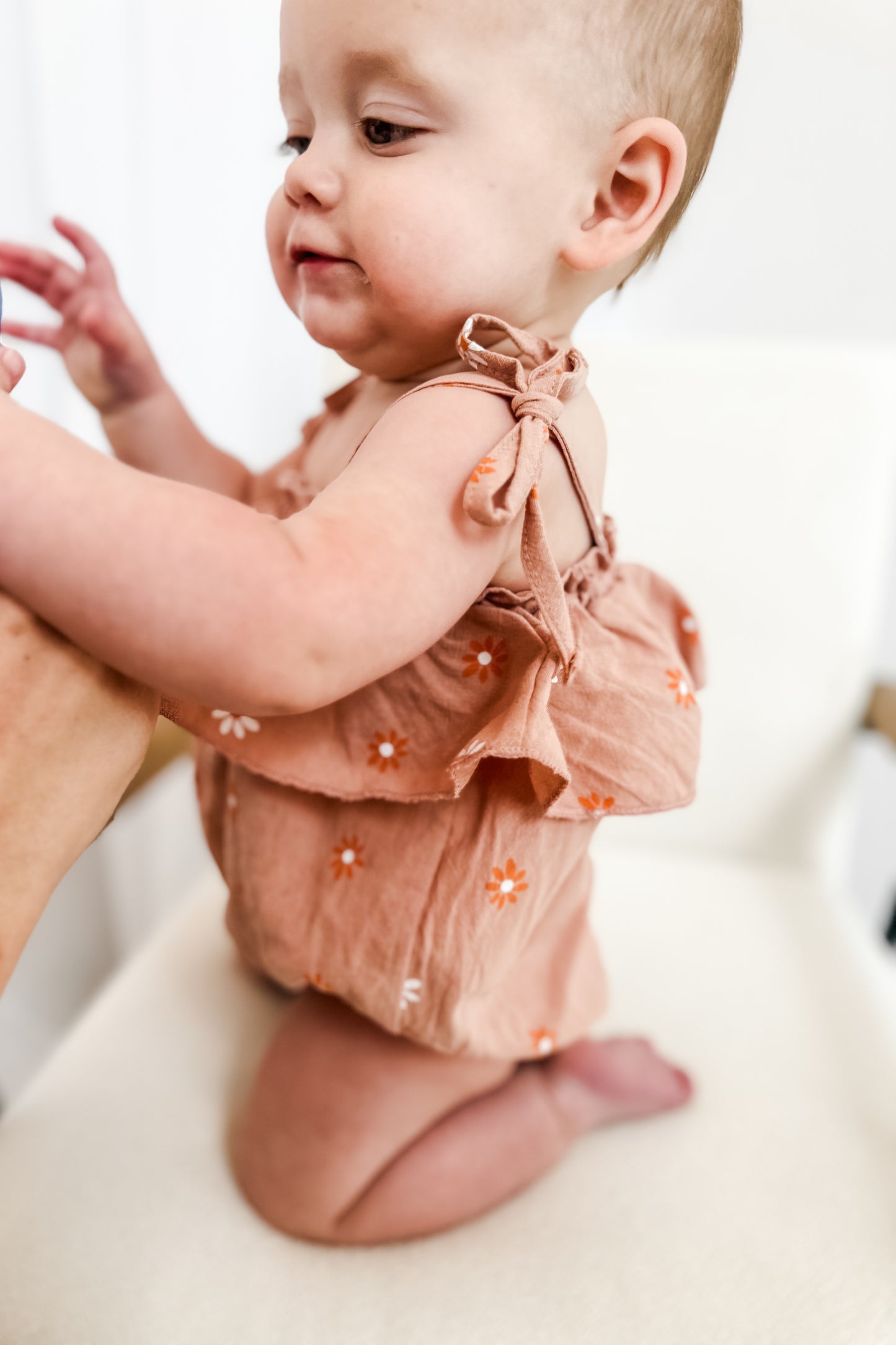 Dusted orange daisy romper