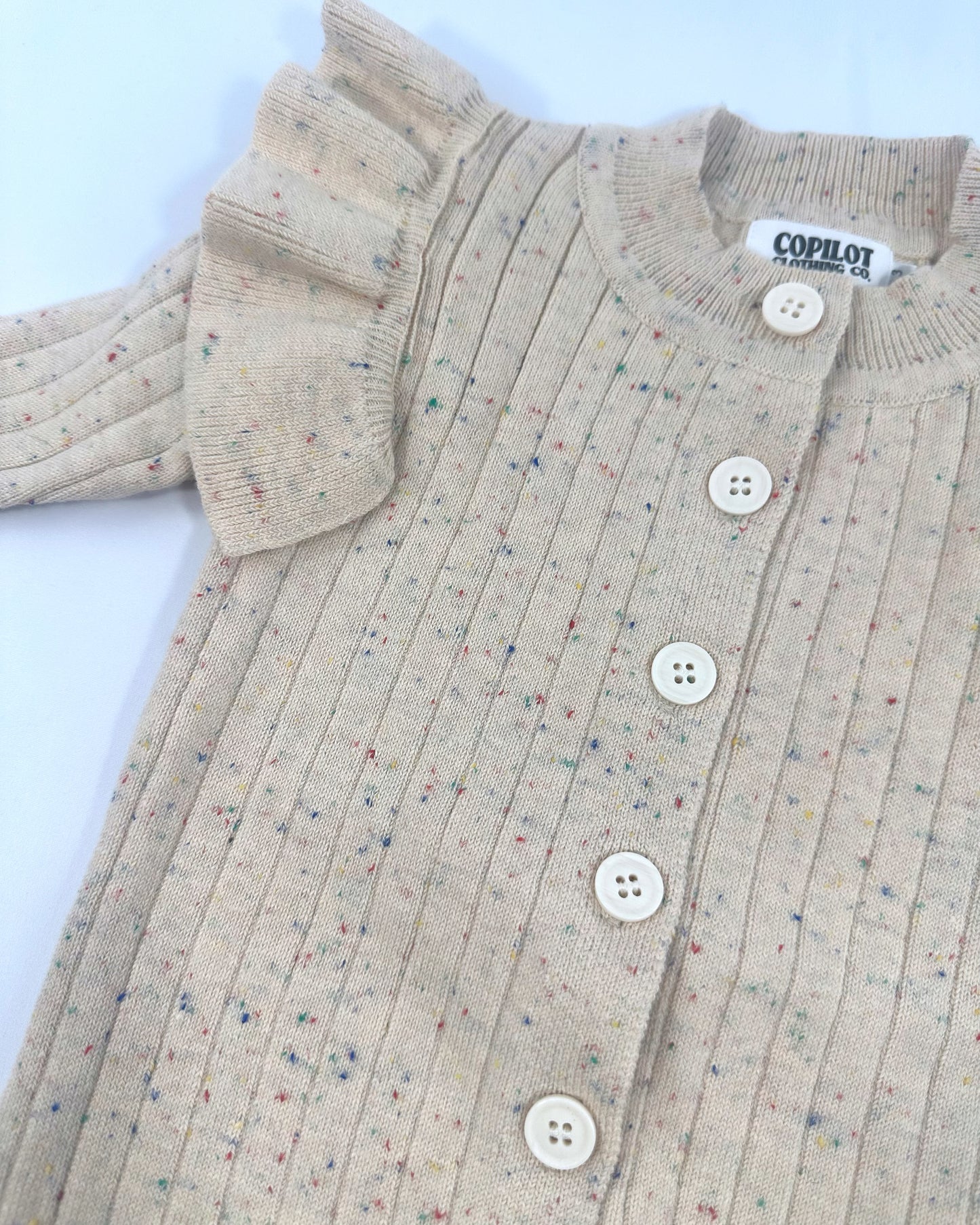 Speckles & flutters sweater romper