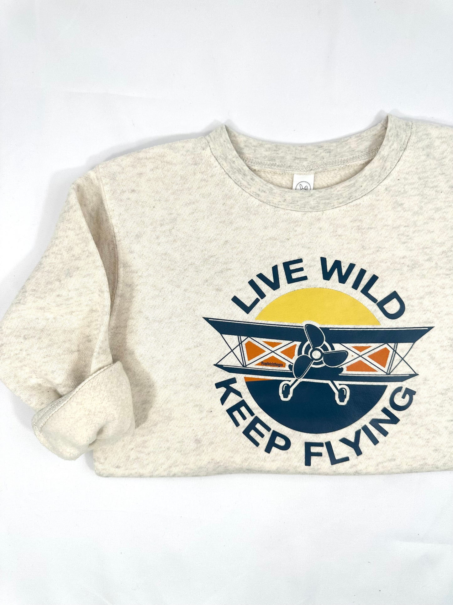 Live wild keep flying graphic