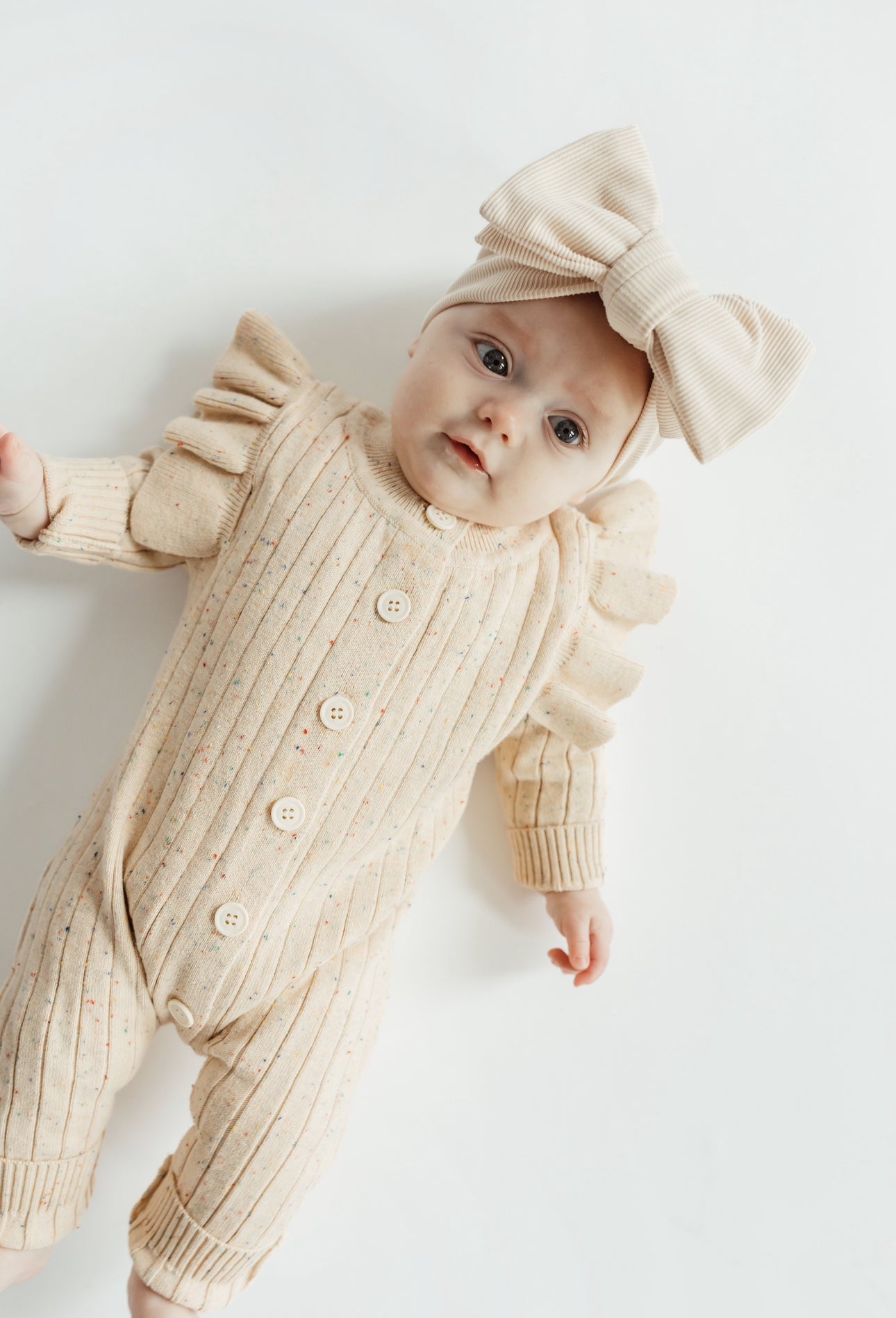 Speckles & flutters sweater romper