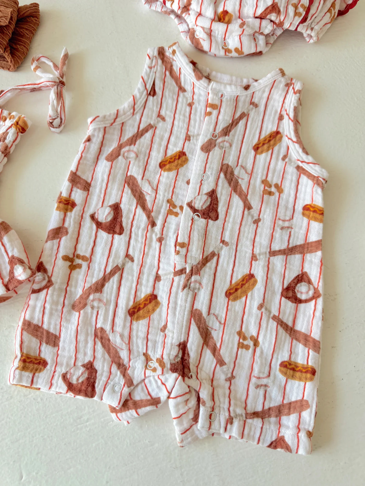 Play ball muslin romper