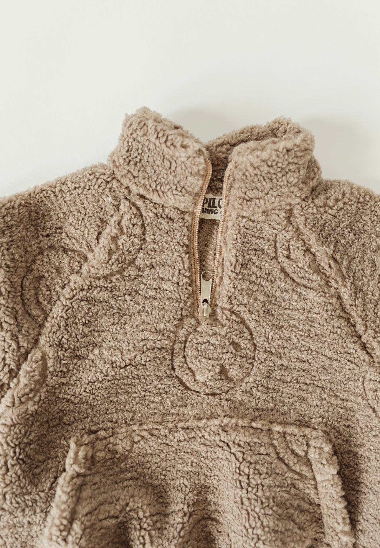 Smiley Sherpa pullover
